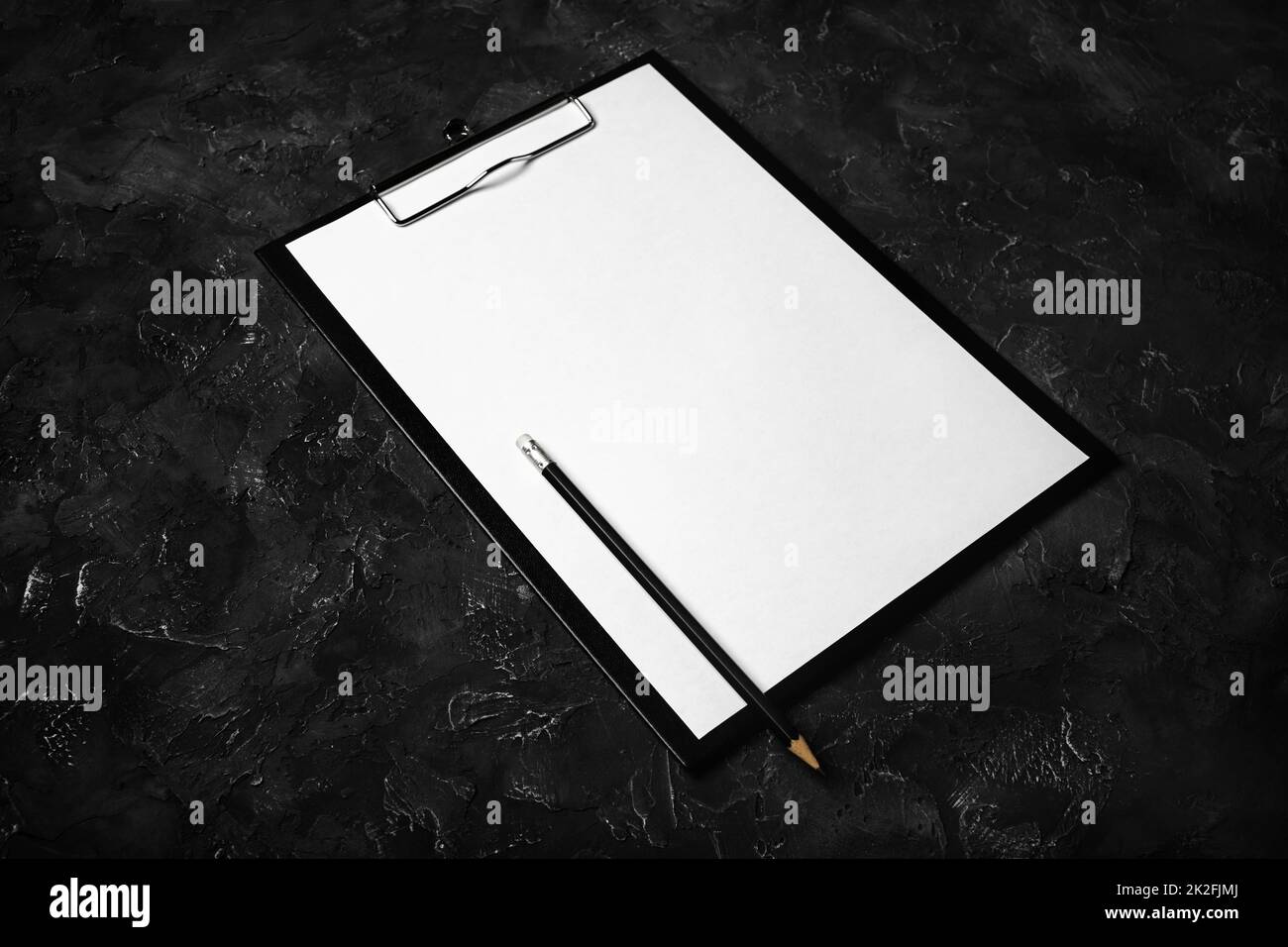 Zwischenablage und Bleistift Stockfoto