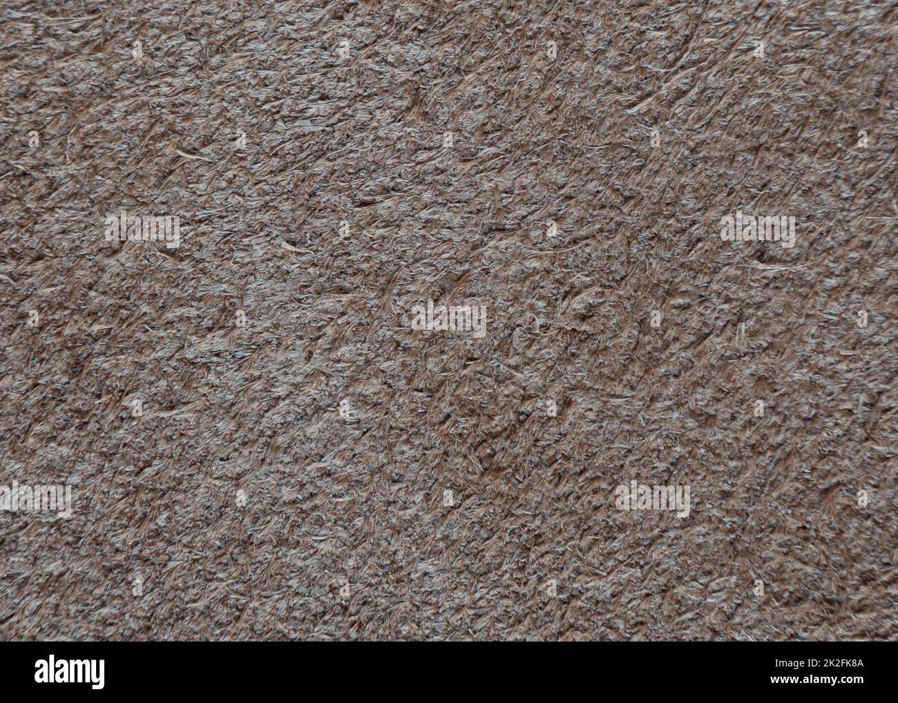 Brauner Hintergrund aus Wildleder. Rückseite aus braunem Naturleder. Stockfoto