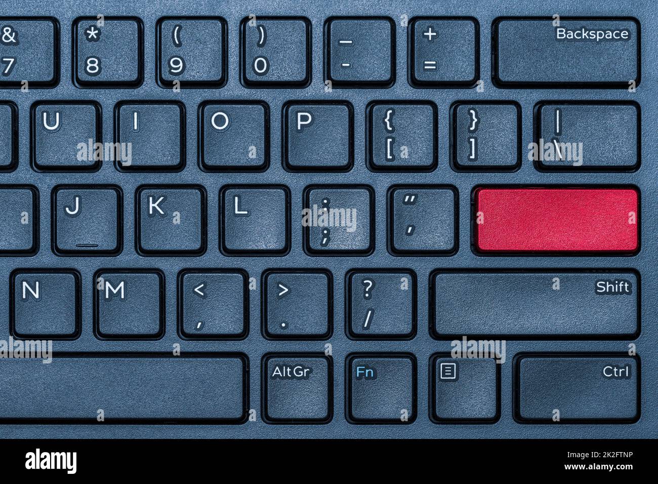Leere rote Taste auf der blauen Tastatur Stockfoto