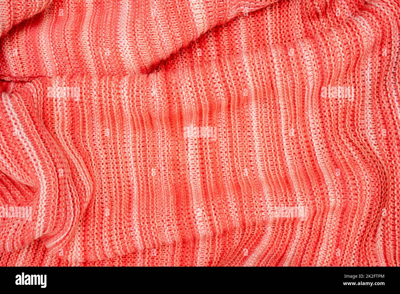 Rot warmer Pullover textiler Hintergrund Stockfoto