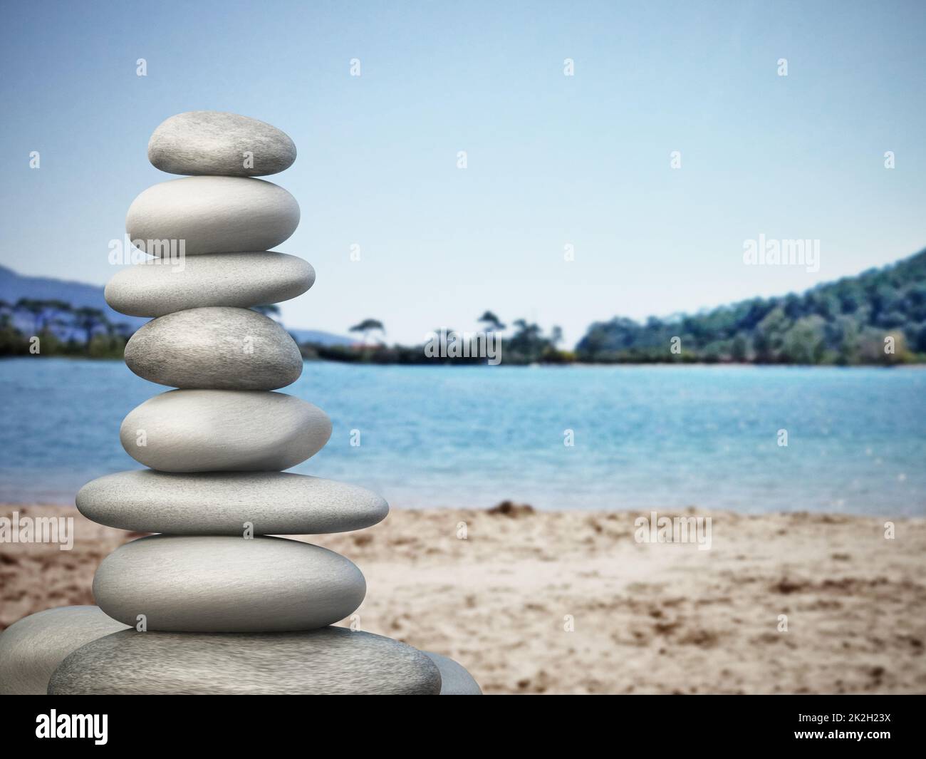 Balancierte Steine am Strand Stockfoto