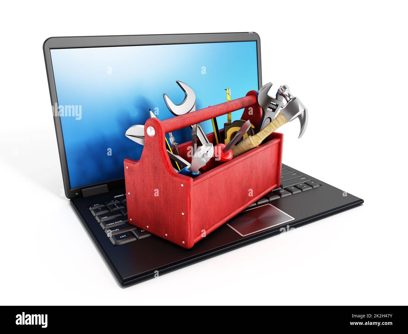 Roter Werkzeugkasten steht auf einem Laptop Stockfoto