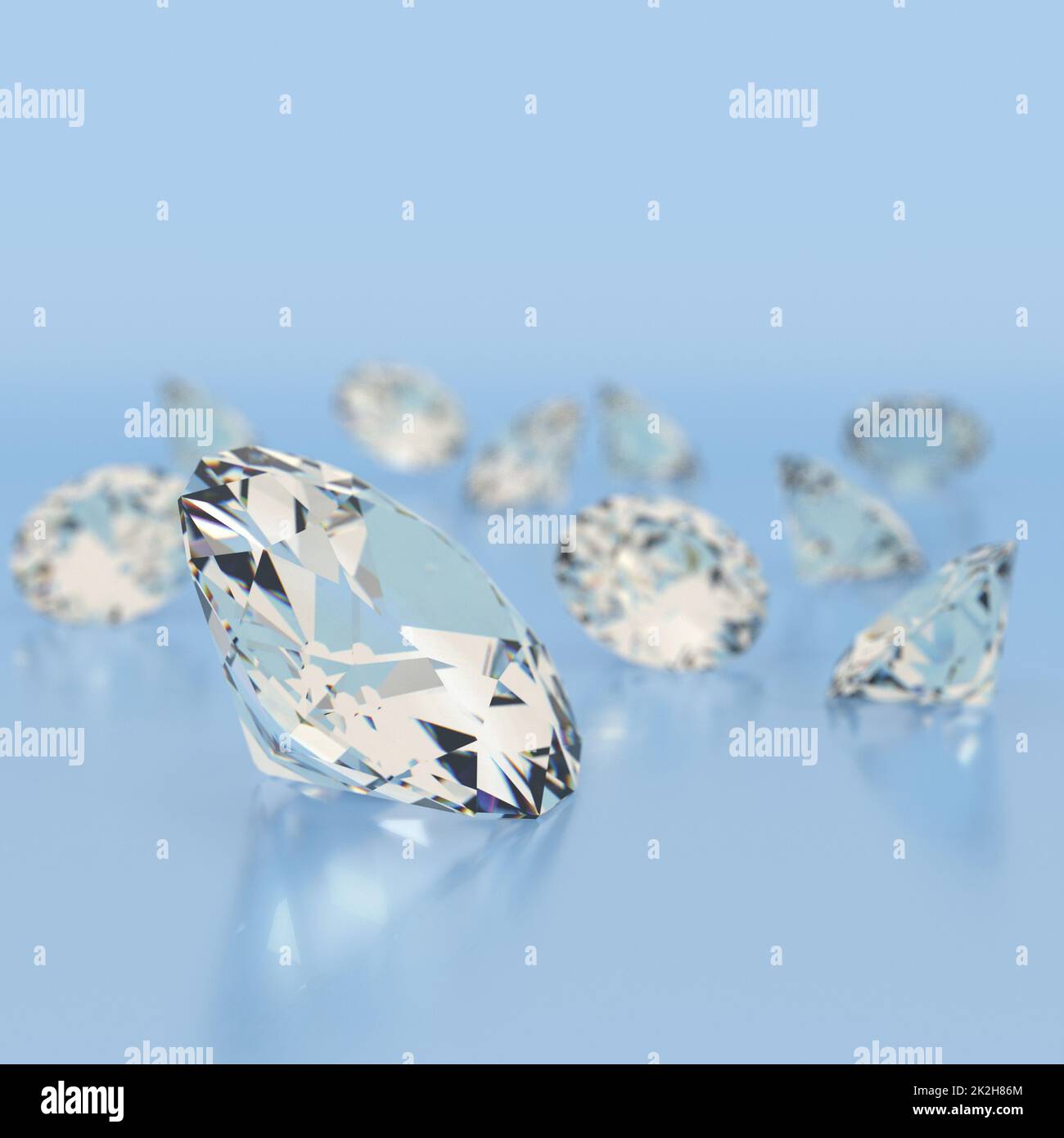 Glänzende weiße Diamanten auf blauem Hintergrund. Stockfoto