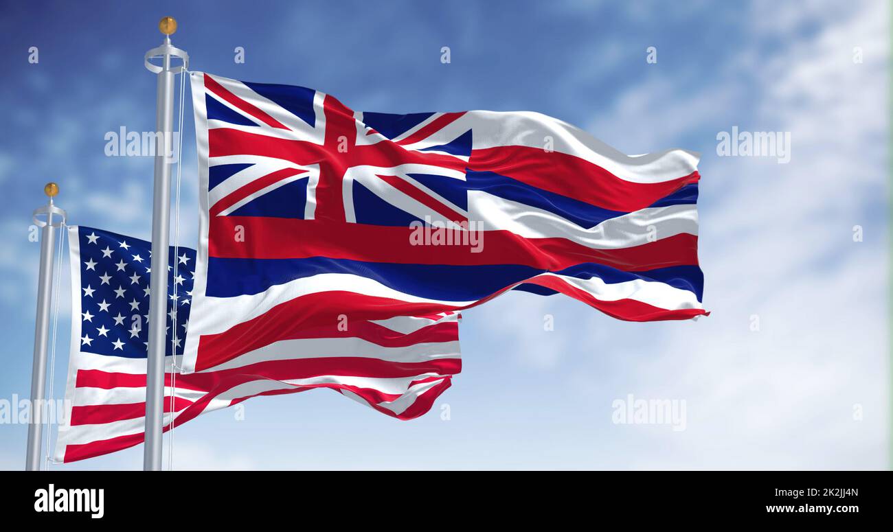 Die Hawaii-Staatsflagge winkt zusammen mit der Nationalflagge der Vereinigten Staaten von Amerika. Stockfoto