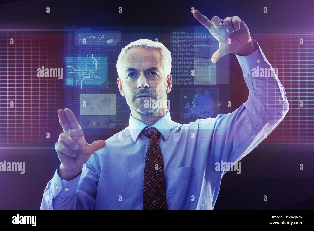 Technologie heranzoomen. CGI-Aufnahme eines Geschäftsmannes über eine digitale Schnittstelle. Stockfoto