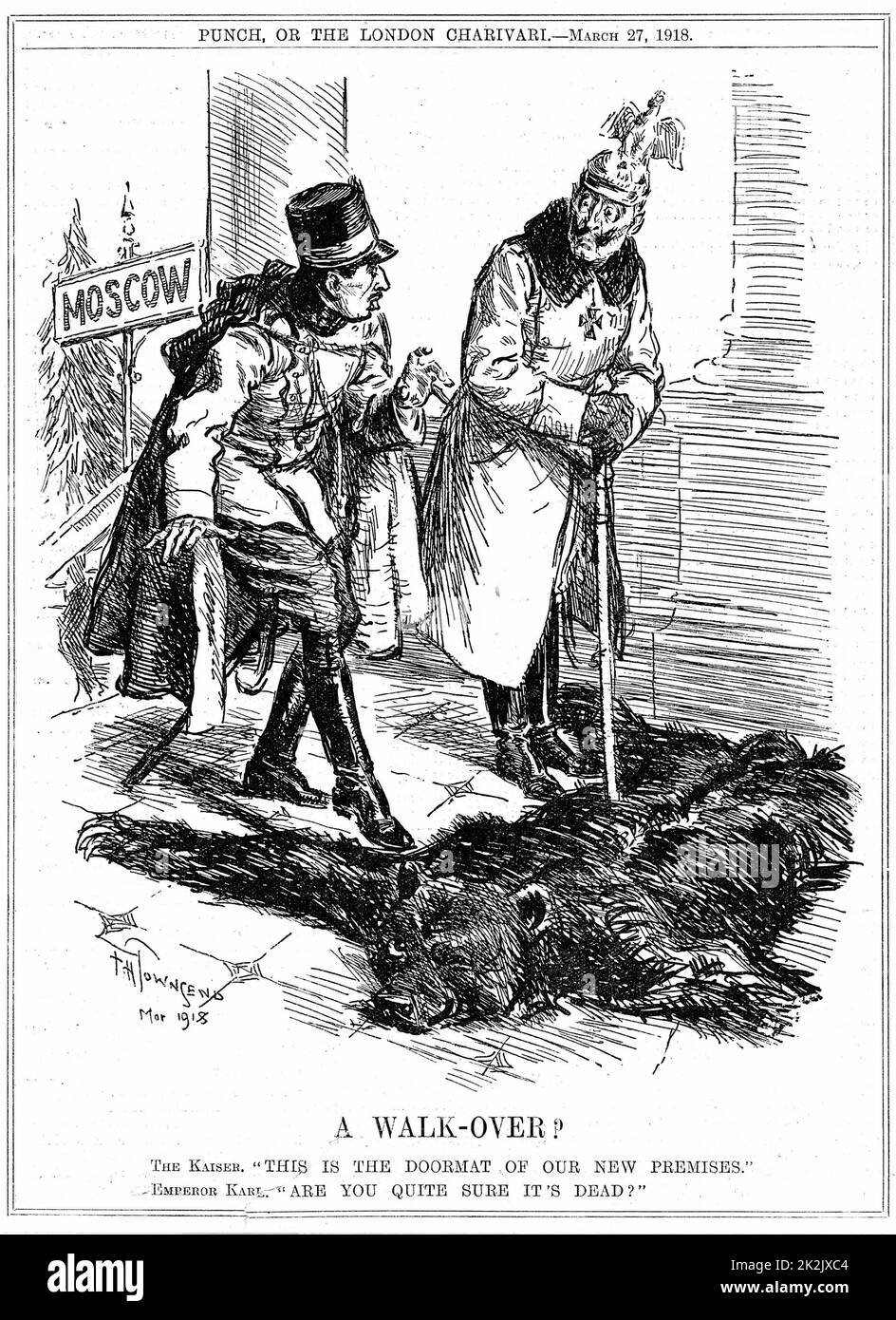 Erster Weltkrieg: Der deutsche Kaiser Willem II. Betrachtet Russland als Fußmatte zu seinen neuen Territorien, während der österreichische Kaiser Karl I. vorsichtiger vorgeht. Karikatur aus „Punch“, London, 27. März 1918 Stockfoto