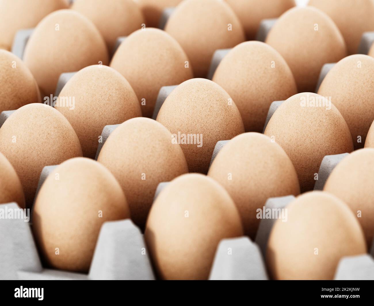 Packung brauner Eier mit Tiefenfeldeffekt. 3D Abbildung Stockfoto