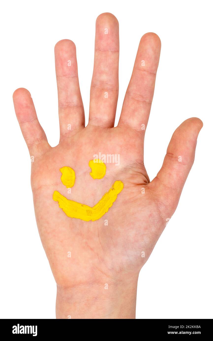 Hand mit gemaltem Smiley-Symbol Stockfoto