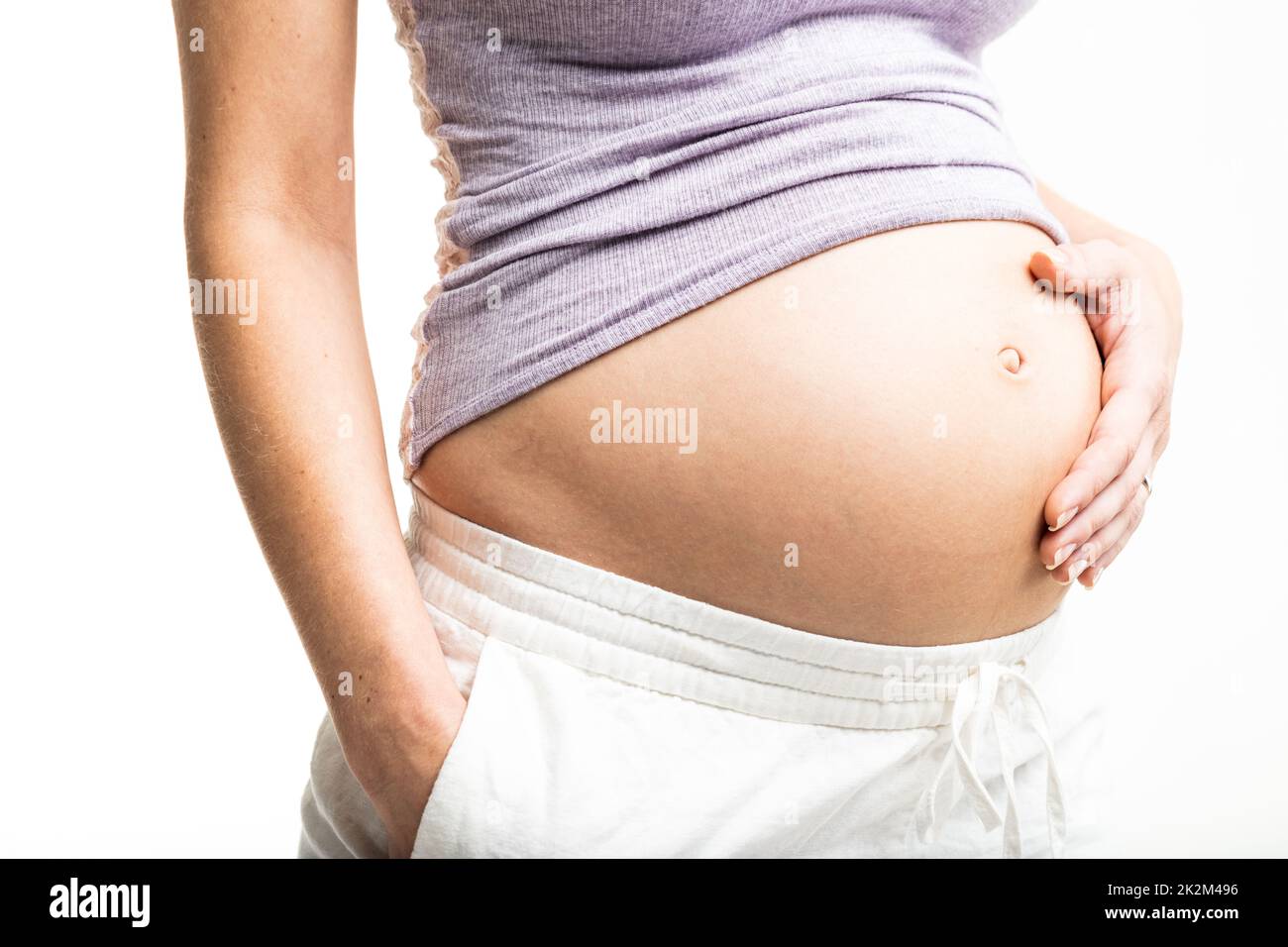 Schwangere Frau Hand auf den Bauch Stockfoto