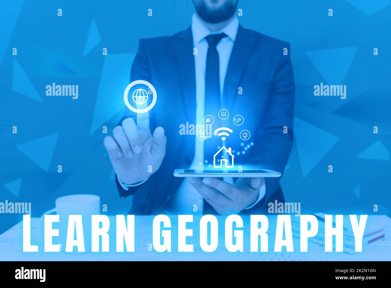 Schreiben mit Text Geografie lernen. Business Concept Study of Physical Features of Earth and its Atmosphere man Hold Screen of Mobile Phone Showing the futuristic Technology. Stockfoto