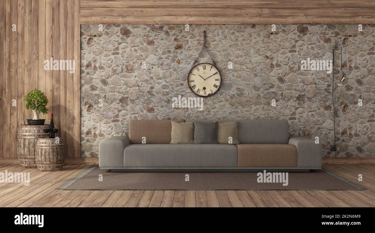 Wohnzimmer im rustikalen Stil mit Steinwänden und Holztäfelung Stockfoto