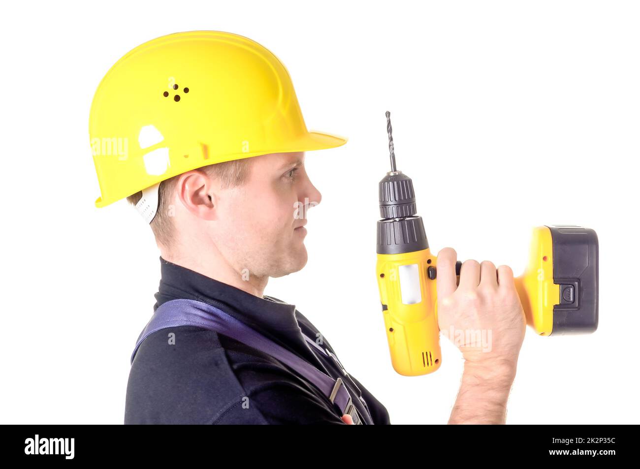 Porträt eines jungen Handwerkers, Arbeiter, Monteur vor weißem Hintergrund Stockfoto