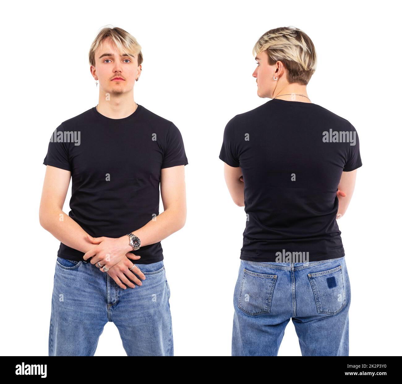 Junger Mann, der mit schwarzem Hemd posiert Stockfoto