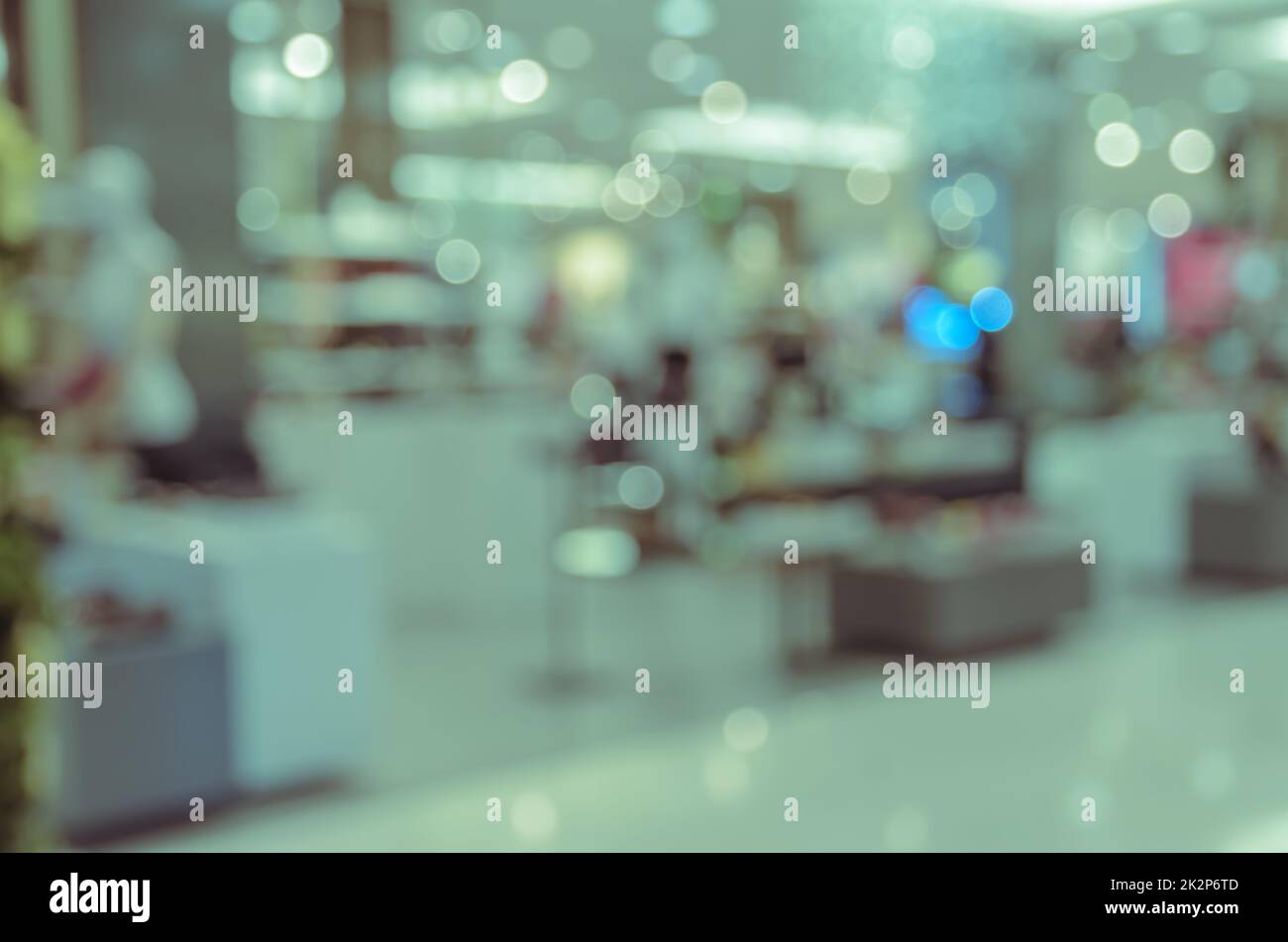 Abstrakt verwackelte Bild von Einkaufszentrum oder Kaufhaus Innenraum Hintergrund Bokeh Licht Stockfoto