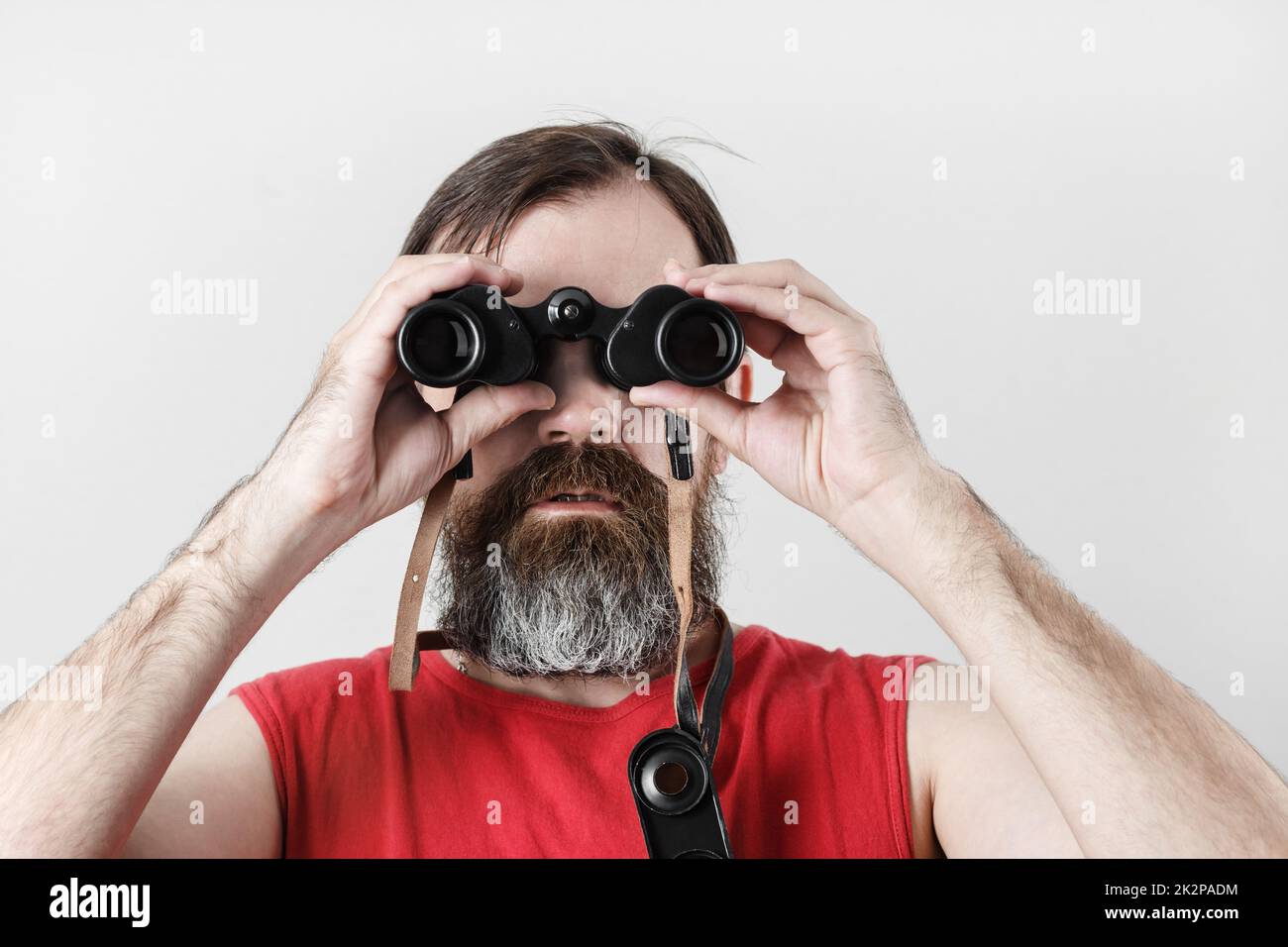 Mann mit dem Fernglas Stockfoto