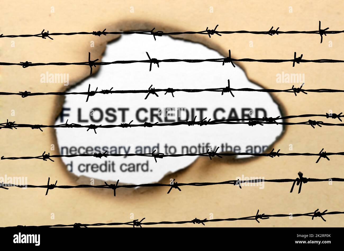 Verlorene Kreditkarte nad barbwire Stockfoto