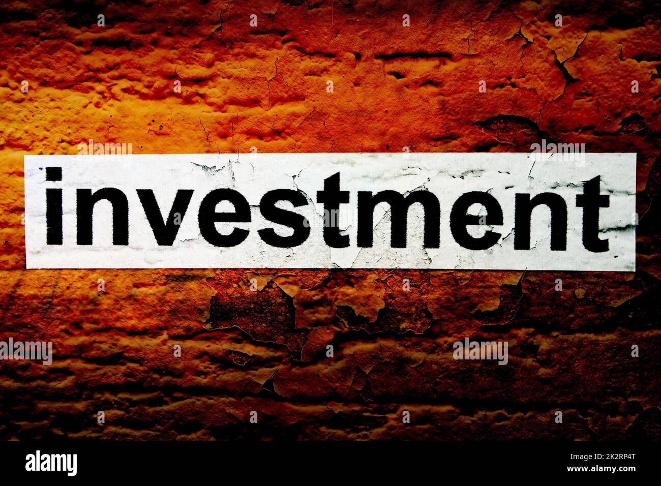 Investitionen-Text auf Grunge Hintergrund Stockfoto
