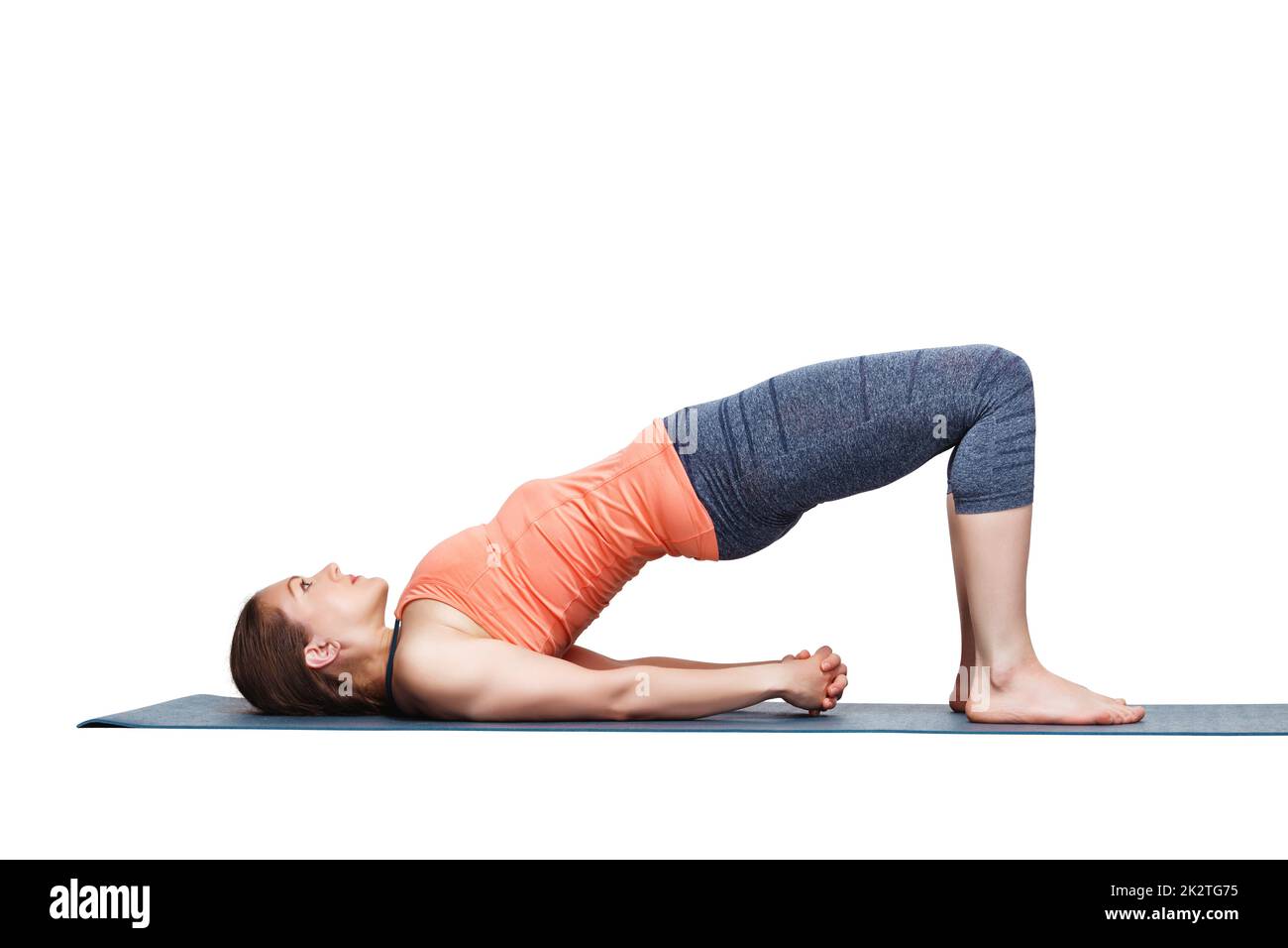 Schön sportlich Fit Yogi Mädchen praktiziert Yoga Asana Setu bandhas Stockfoto