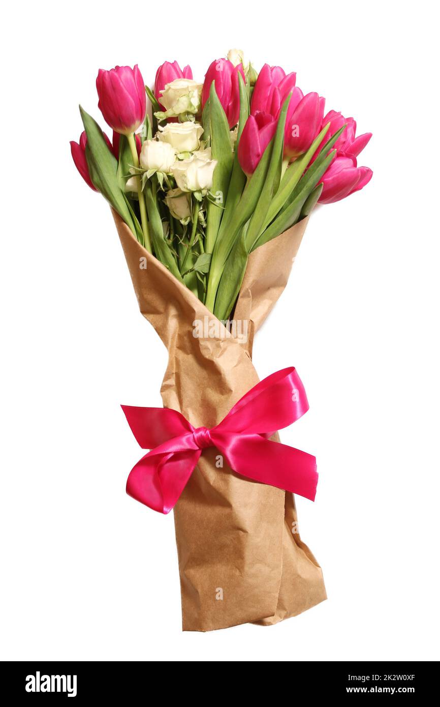 Bouquet von rosa holländischen Tulpen und weißen Miniaturrosen Stockfoto