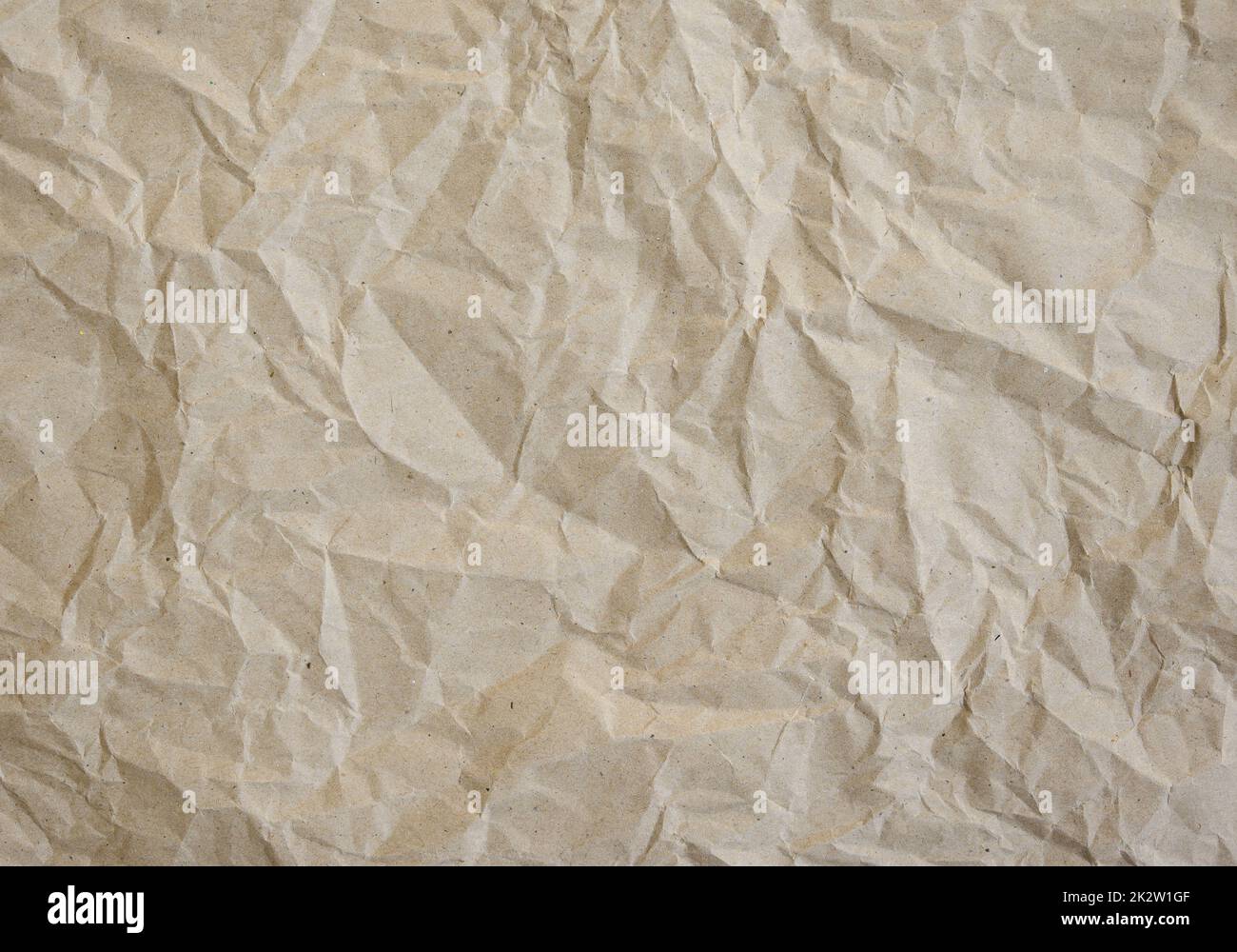 Papierstruktur Hintergrund von braunem zerknittertem recyceltem Papppapier Stockfoto