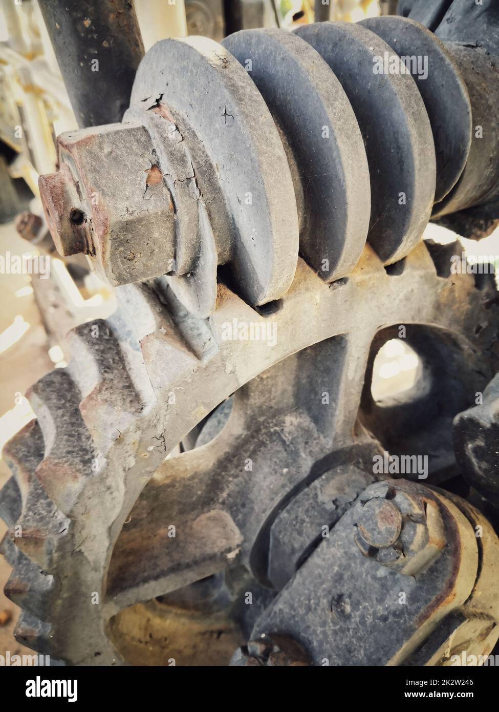 Zahnrad-Kettenrad mit Achse Stockfoto