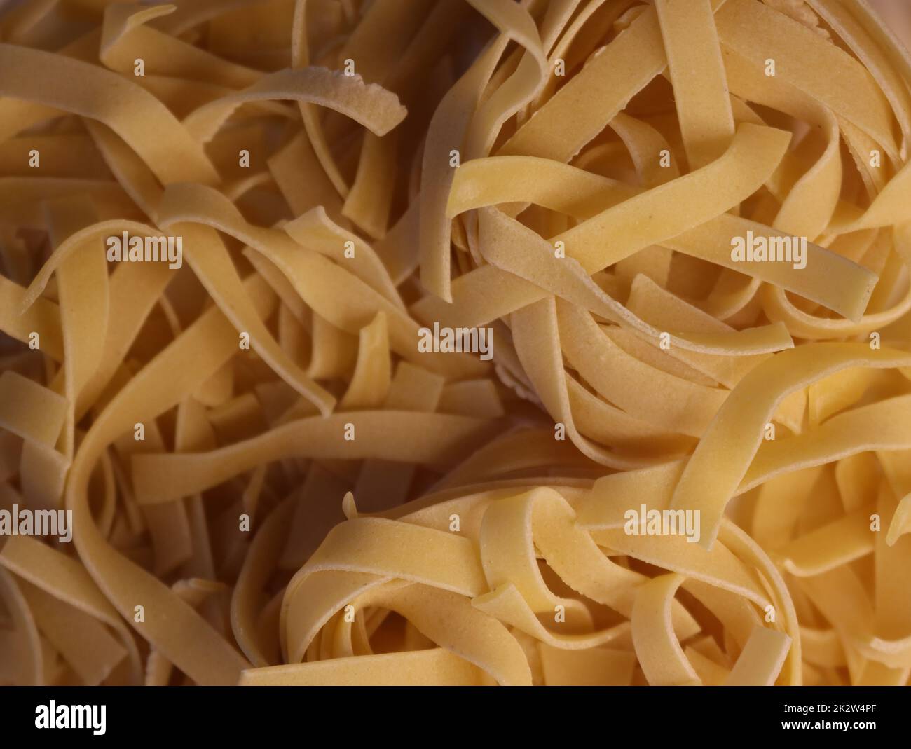 Köstliche italienische Pasta natürliche Lebensmittel gesunde Kohlenhydrate Hintergrund Stockfoto