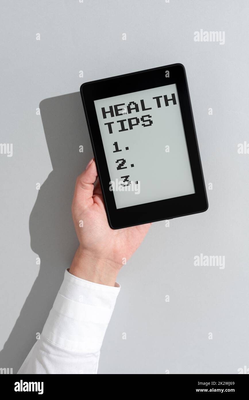 Textschild mit Gesundheitstipps. Wort für den Zustand des vollständigen physischen mentalen und sozialen Wohlbefindens -47168 Stockfoto