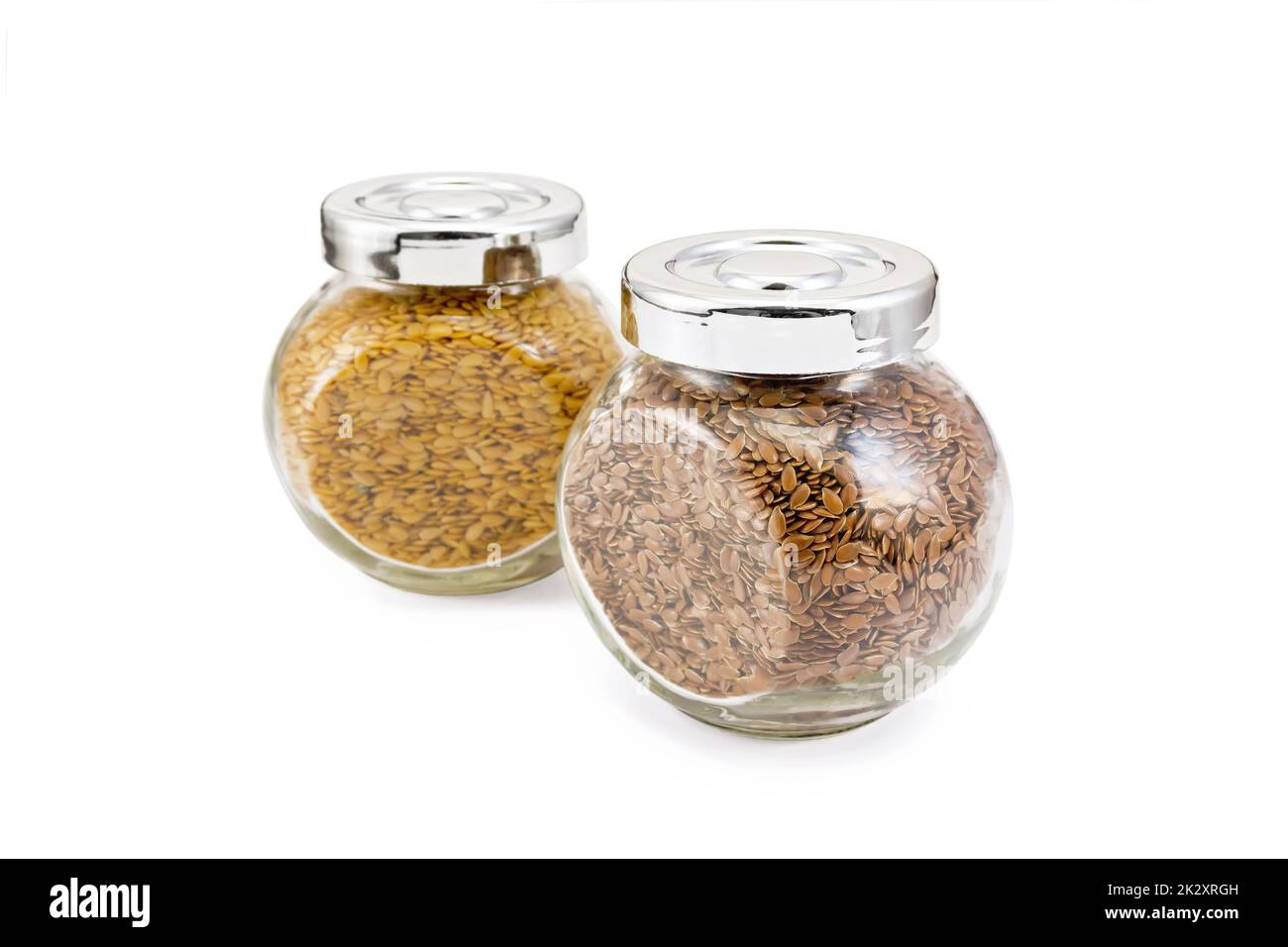 Leinsamen weiß und braun in Glasgefäßen Stockfoto