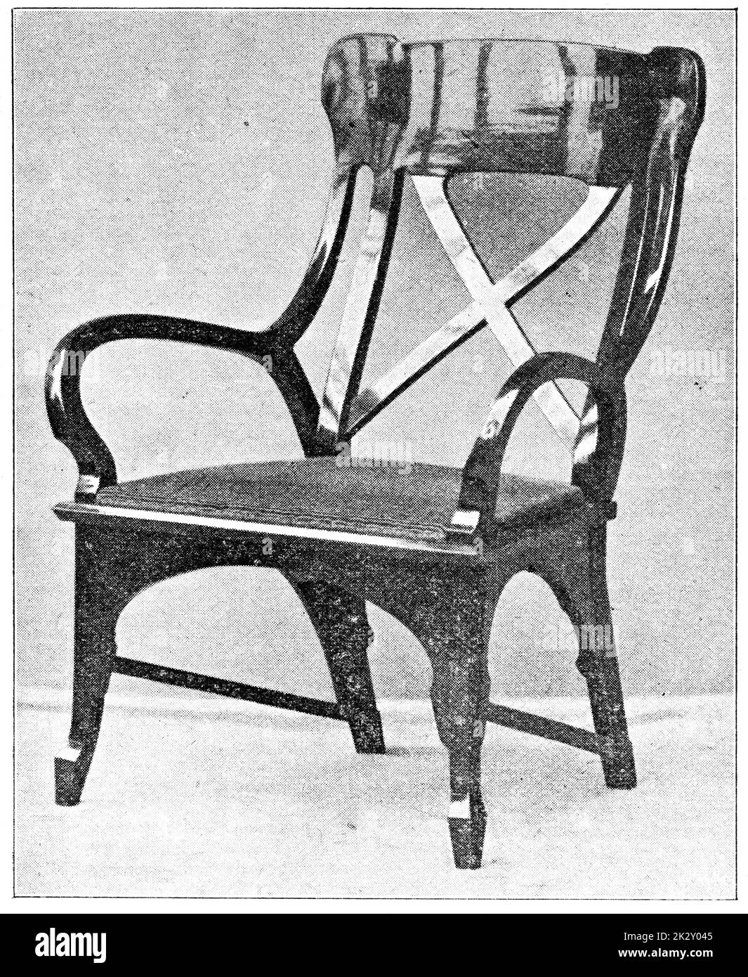 Sessel aus Holz aus Mahagoni. Illustration des 19. Jahrhunderts. Deutschland. Weißer Hintergrund. Stockfoto