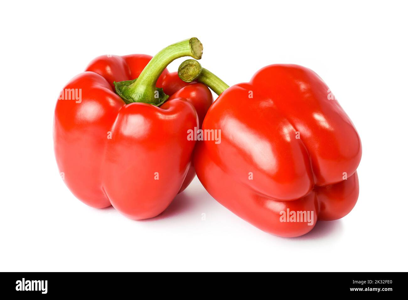 Stock Foto von zwei roten Paprika isoliert auf einem weißen Hintergrund Stockfoto