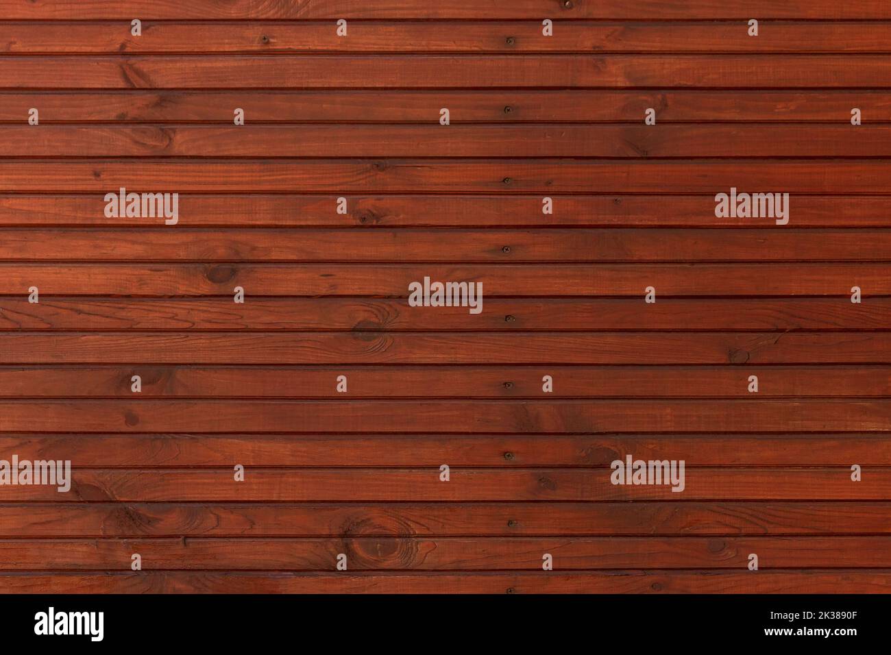 Dunkelbraune Holzwand aus Plankenhintergrund Stockfoto