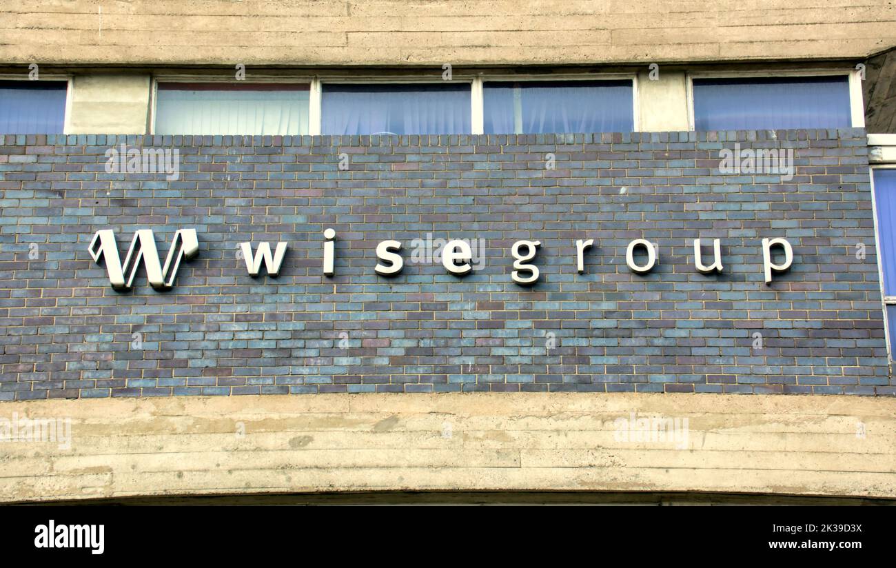 Wisegruppe Schild am Gebäude 72 Charlotte Street, Glasgow, Schottland, Großbritannien Stockfoto