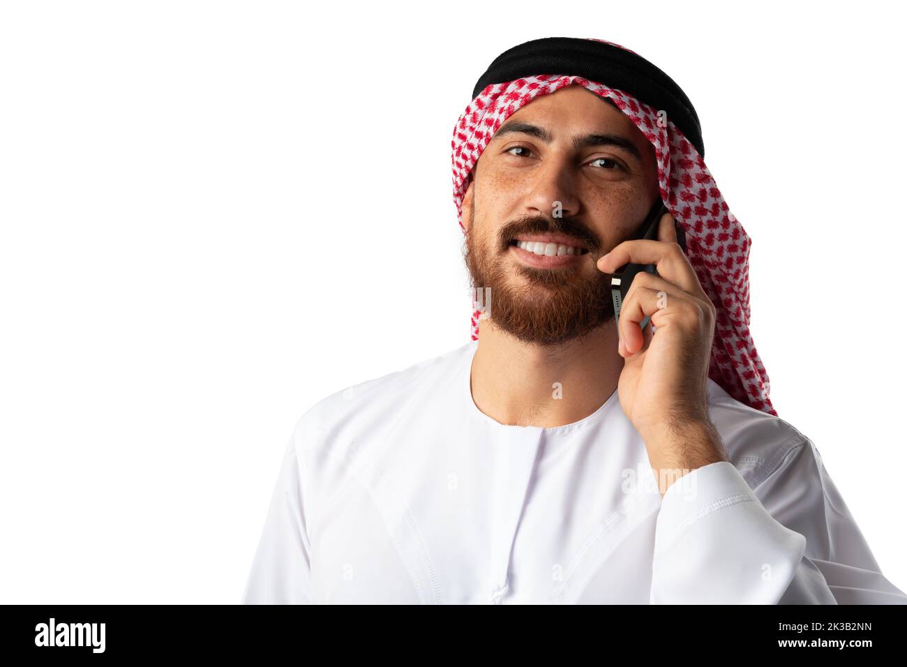 Arabischer Geschäftsmann im Gespräch auf Mobiltelefon isoliert auf weißem Hintergrund Stockfoto