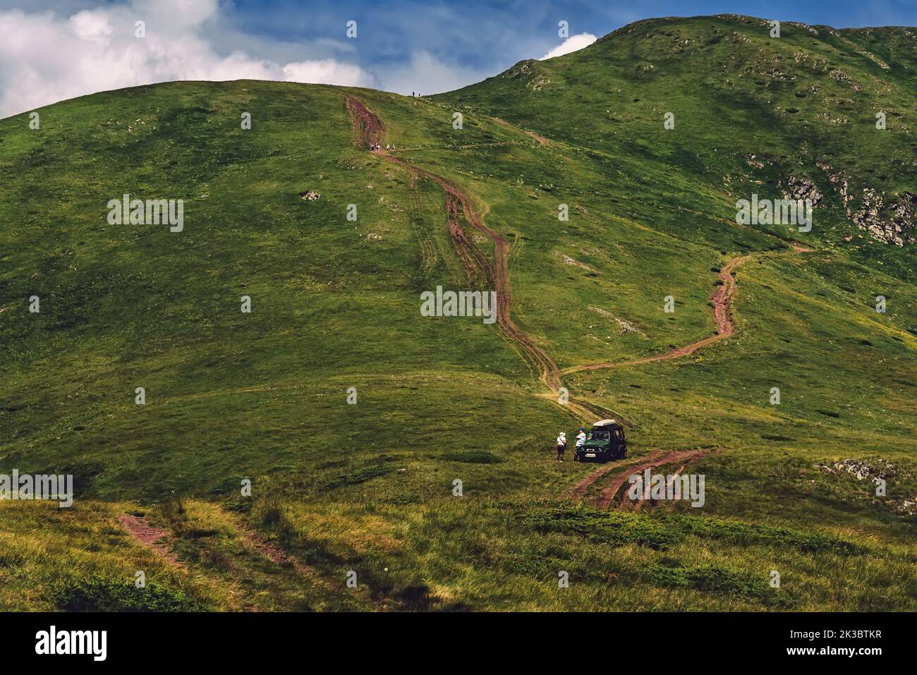 National Park Lanscape mit winzigen Menschen und Auto Stockfoto