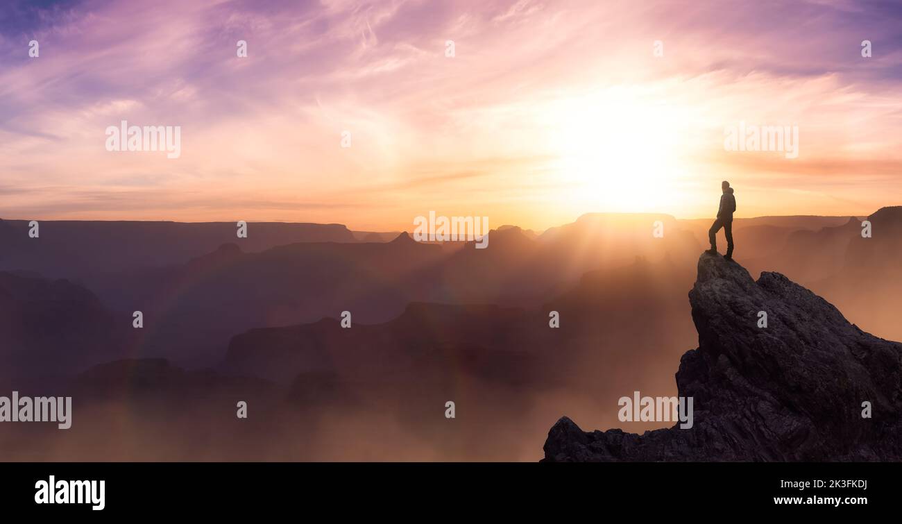 Epic Adventure Composite of man Hiker auf einem felsigen Berg. Animation Stockfoto