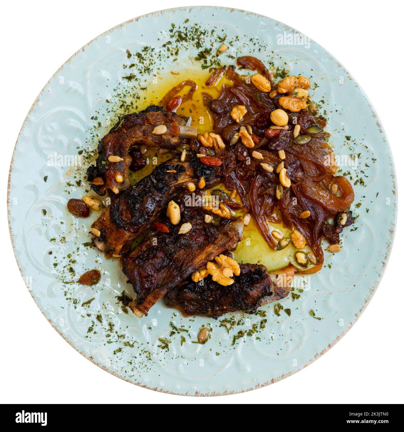 Gebratenes Schweinekotelett mit goldener Kruste serviert mit Sesam und ...