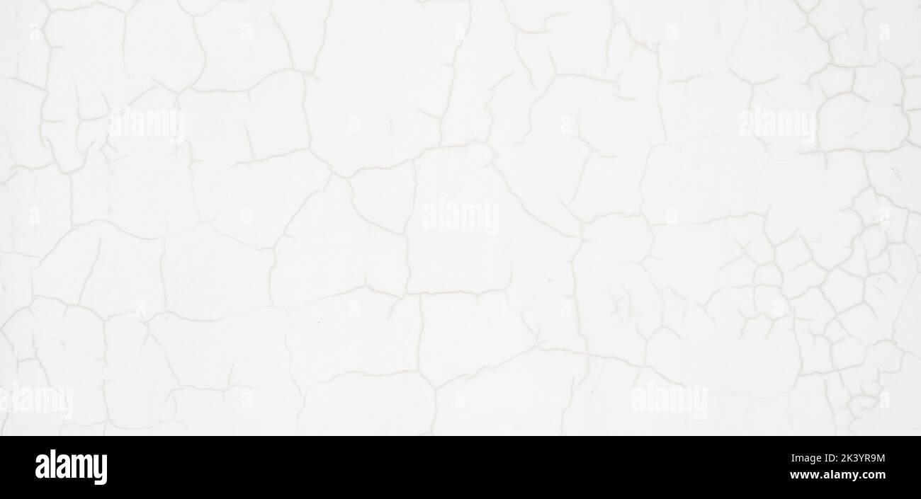 Risse auf einer weißen Wand Stockfoto