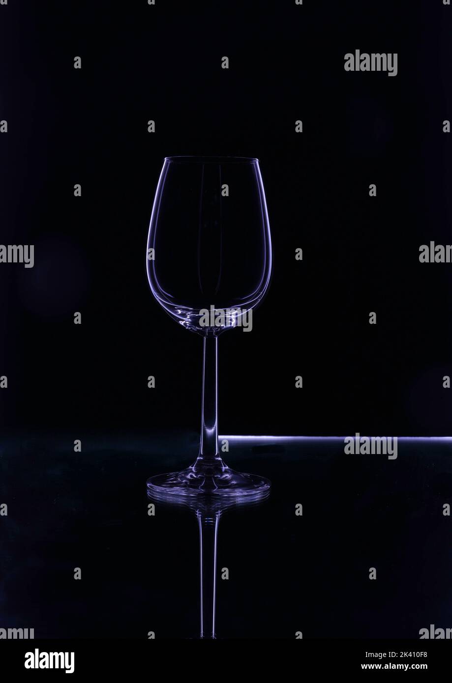 Weinglas Fotografie mit Licht, Licht und Schatten, Partyglas, fancy und formell Stockfoto