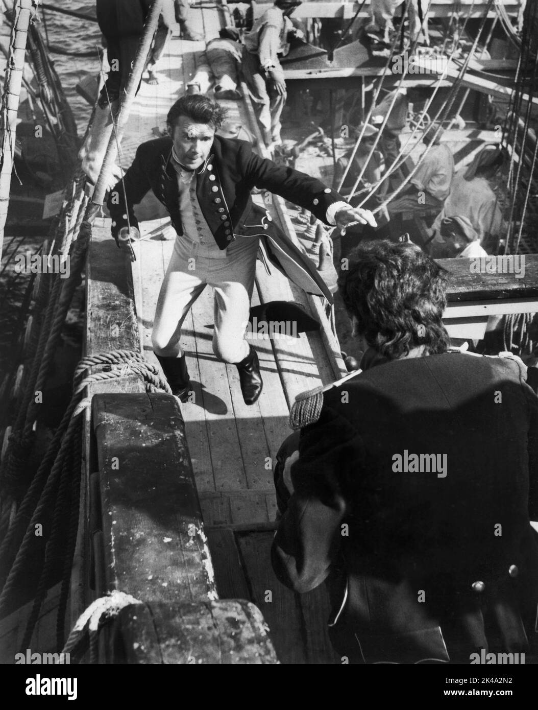 Dirk Bogarde, am Set des britischen Films, „H.M.S. Defiant“, US-Titel ...