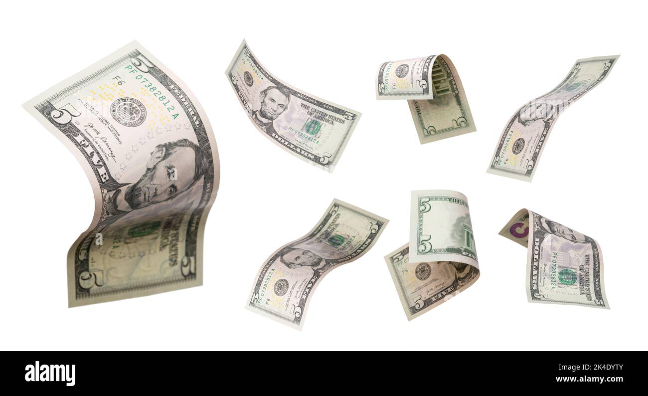 5 Dollar fliegen auf weißem Hintergrund. USA-Banknoten aus verschiedenen Blickwinkeln. Vorderseite Stockfoto