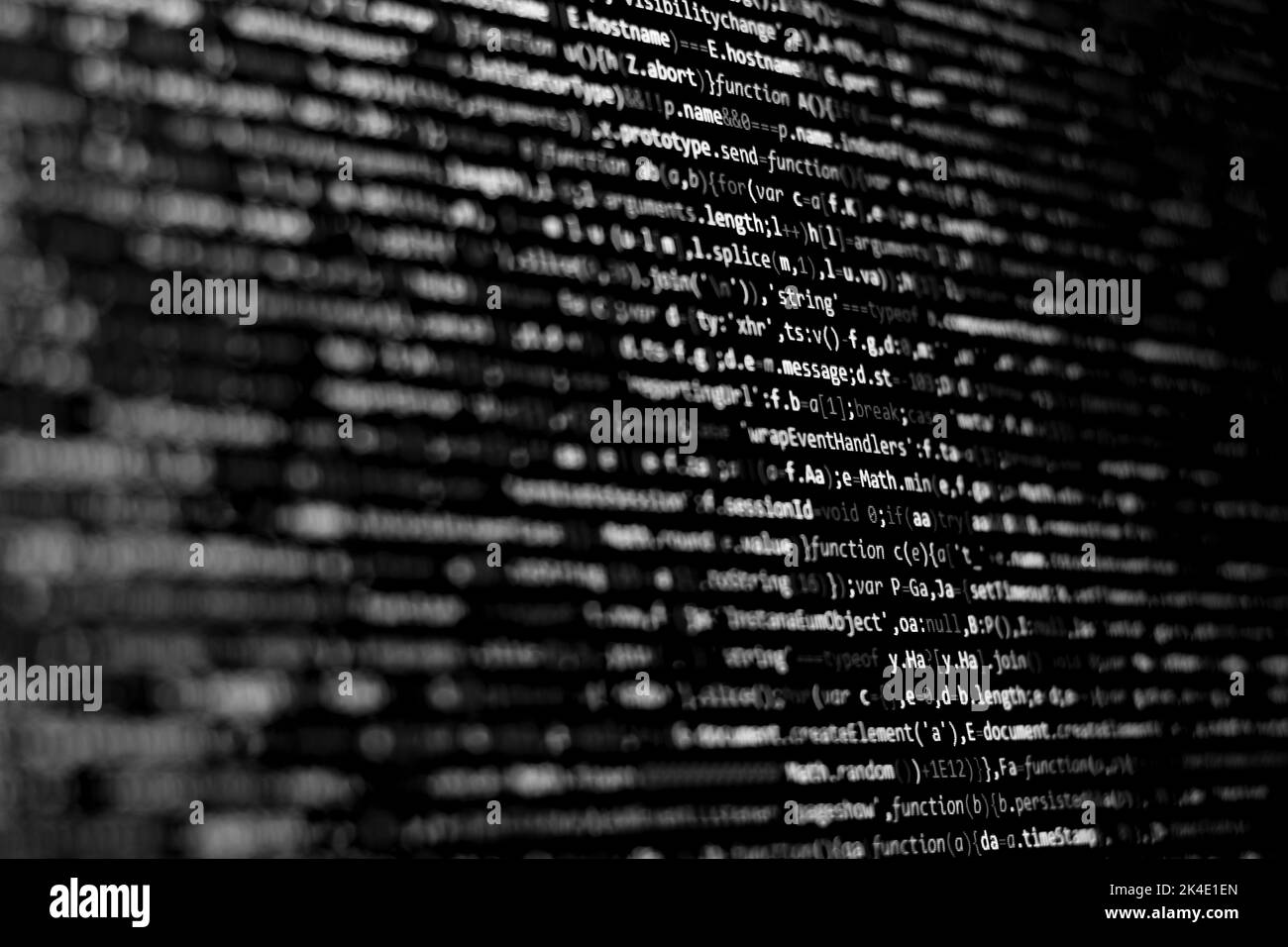 Komprimierter, farbiger Code-Hintergrund. Web-Programmierung mit Javascript-Codierung Stockfoto