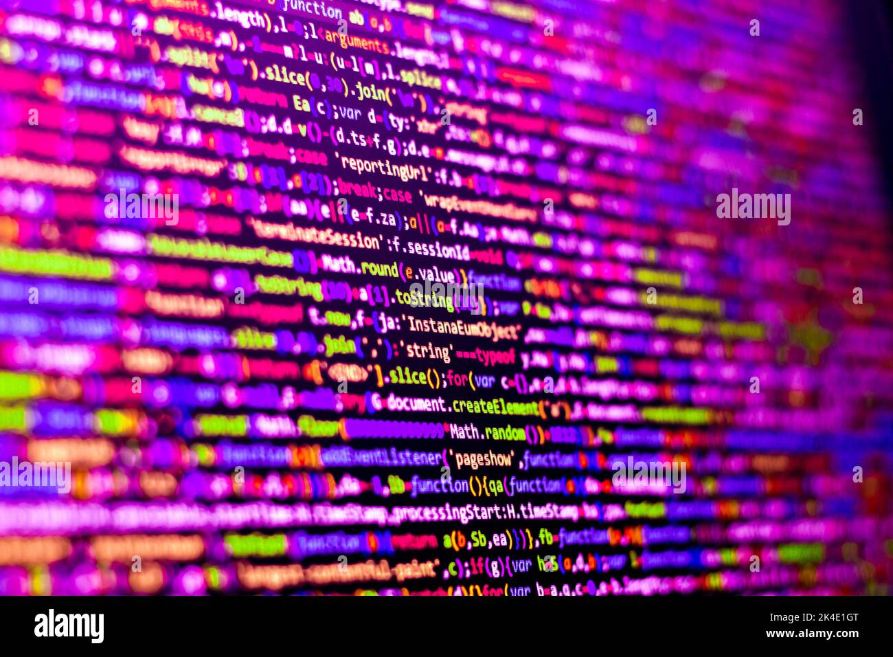 Komprimierter, farbiger Code-Hintergrund. Web-Programmierung mit Javascript-Codierung Stockfoto