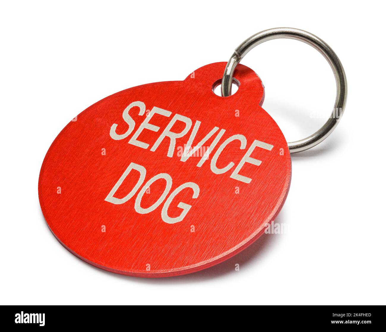 Rote Service Dog Tag auf Weiß ausgeschnitten. Stockfoto