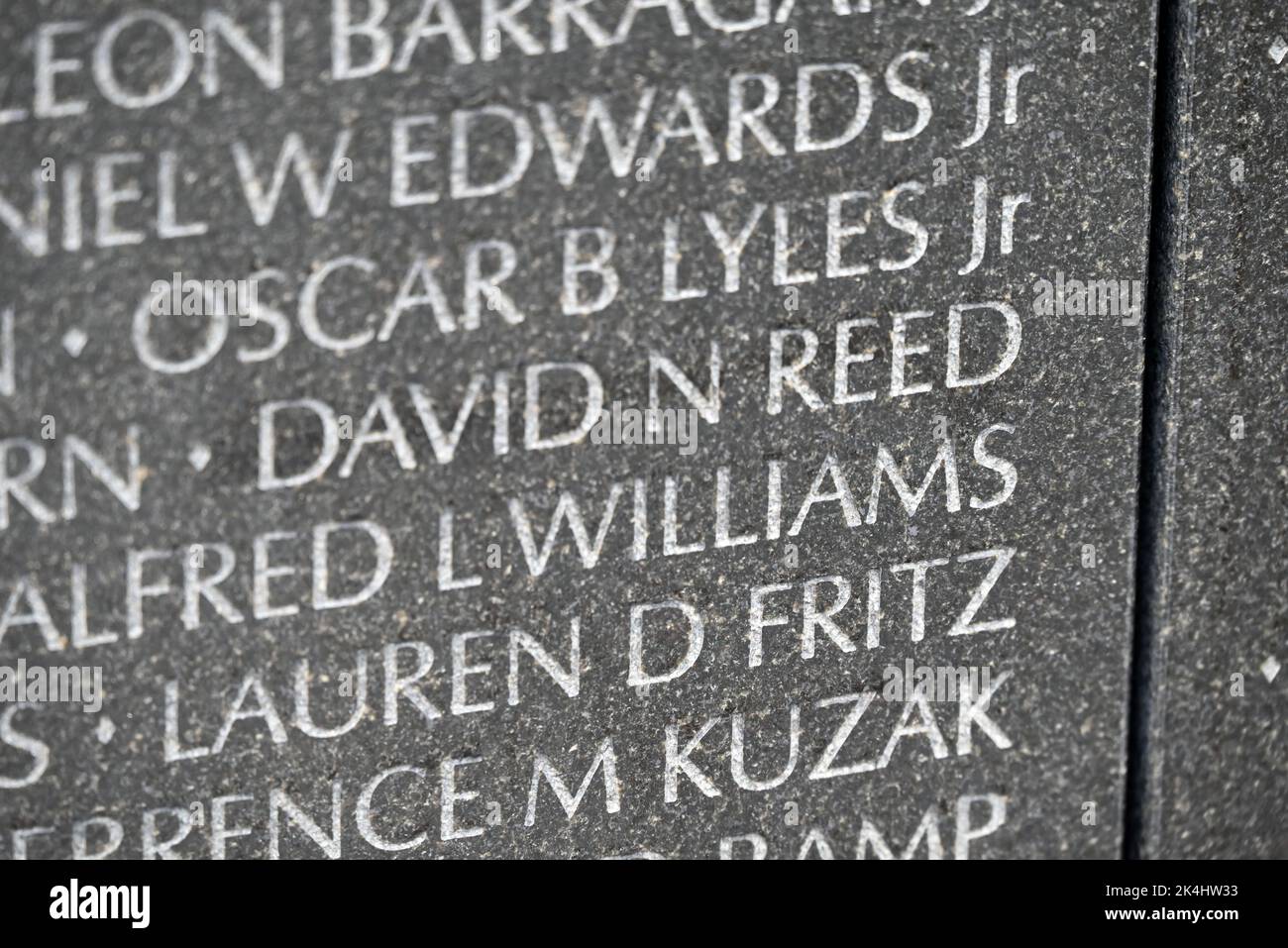 Nahaufnahme des damaligen Namens David Neal Reed, geätzt an der Vietnam Memorial Wall in Washington, DC. David Reed starb am 23. Dezember 1969 an Kampfverletzungen. Stockfoto