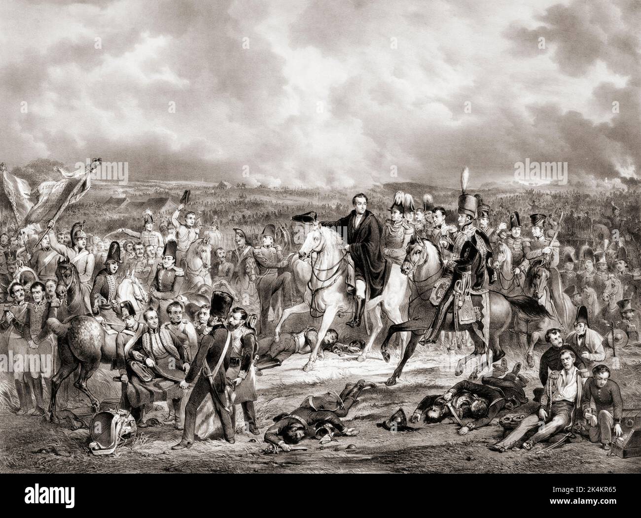 Die Schlacht von Waterloo, 19. Juni 1815. Wellington im Zentrum erhält die Nachricht, dass seine preußischen Verbündeten in der Nähe sind. Links wird der verwundete William, Prinz von Orange, auf einem Wurf fortgetragen. Der Kampf tobt im Hintergrund. Nach einem Gemälde von Jan Willem Pieneman. Stockfoto