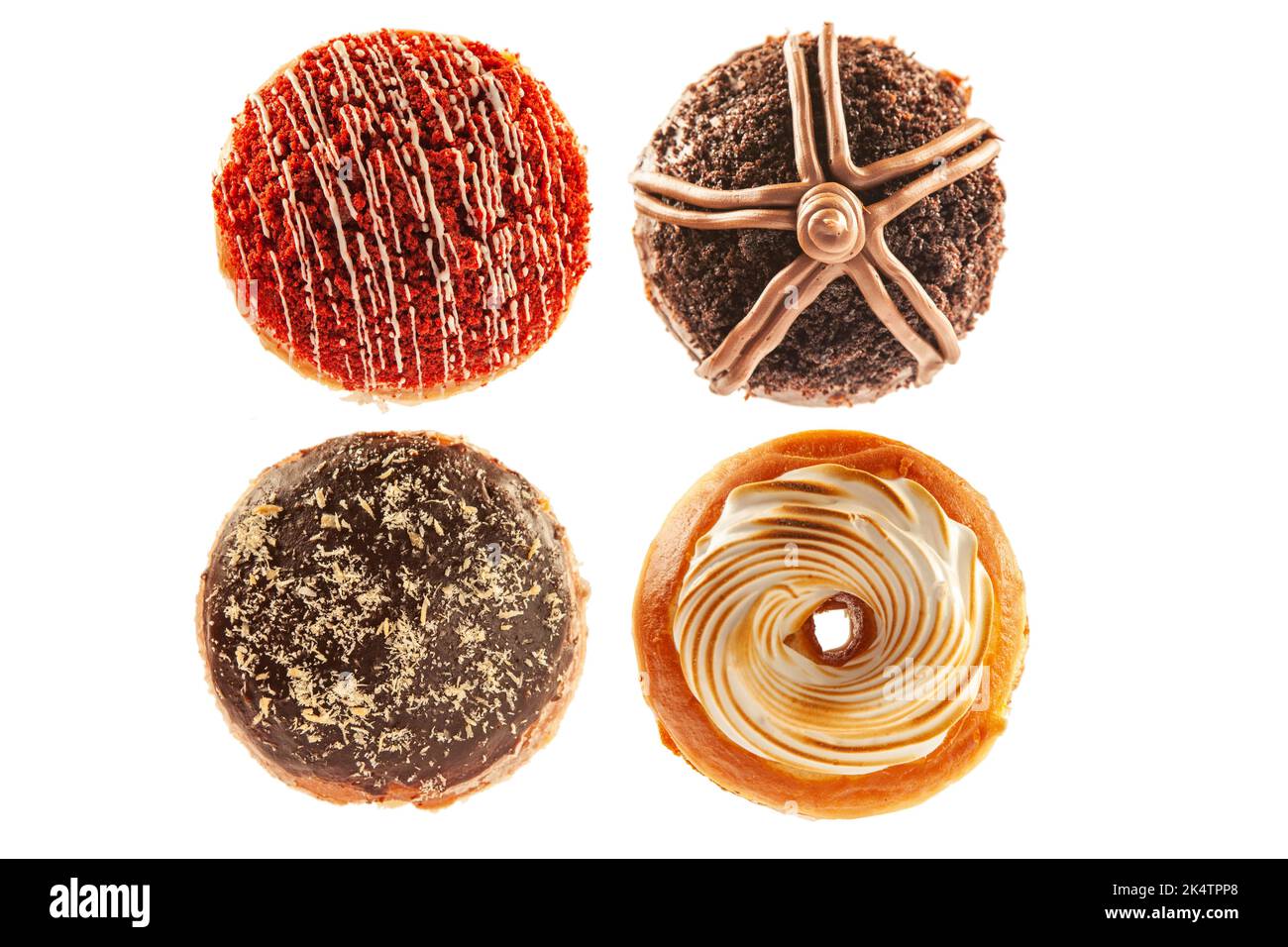 Eine Gruppe von vier verschiedenen Donuts mit Kopfgeld, rotem Samt, Choco-Brownie und Kopfgeld. Stockfoto