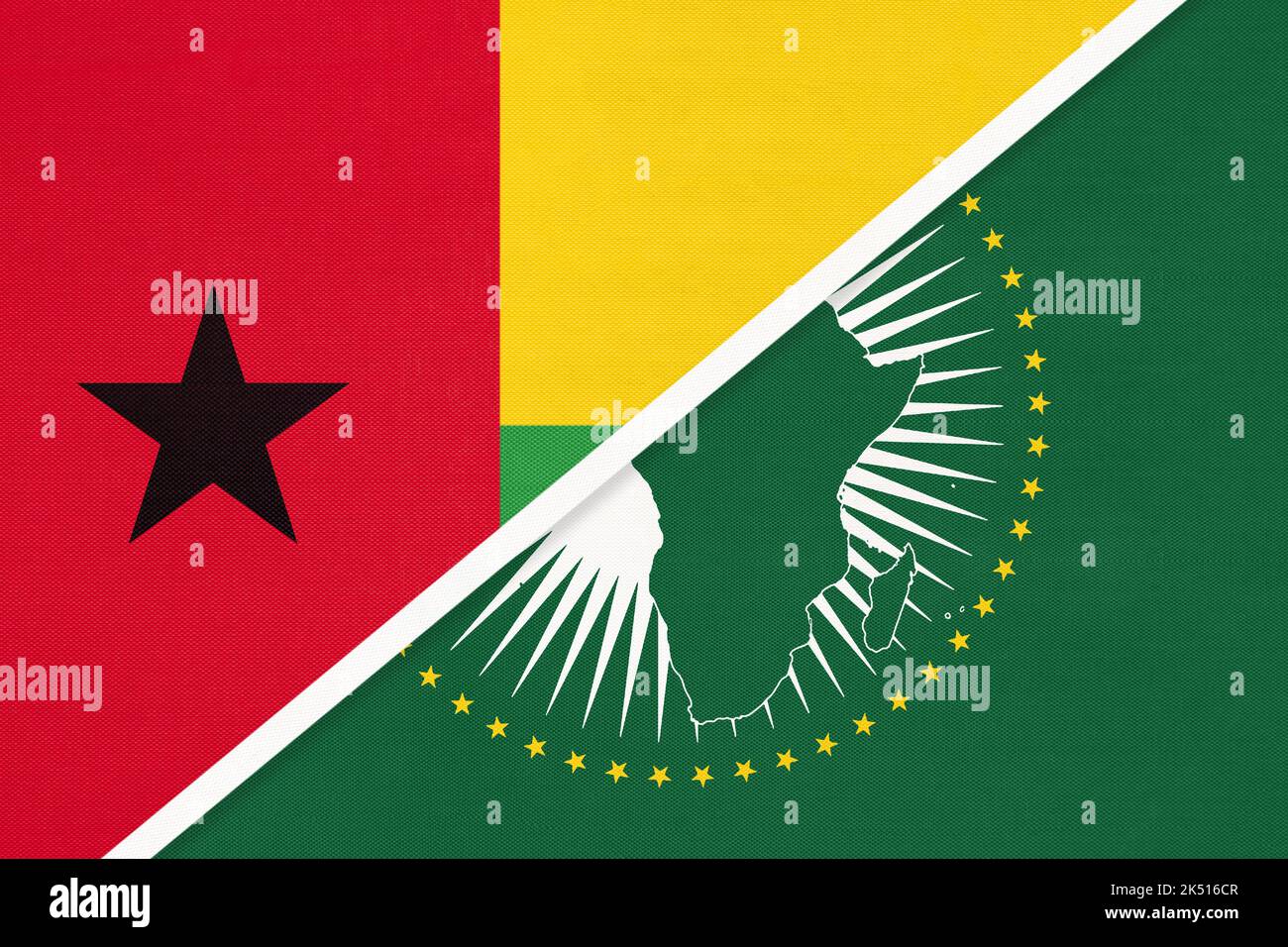 Afrikanische Union und Guinea-Bissau Nationalflagge aus Textil. Afrika-Kontinent vs. Bissau-Guinean-Symbol. Stockfoto