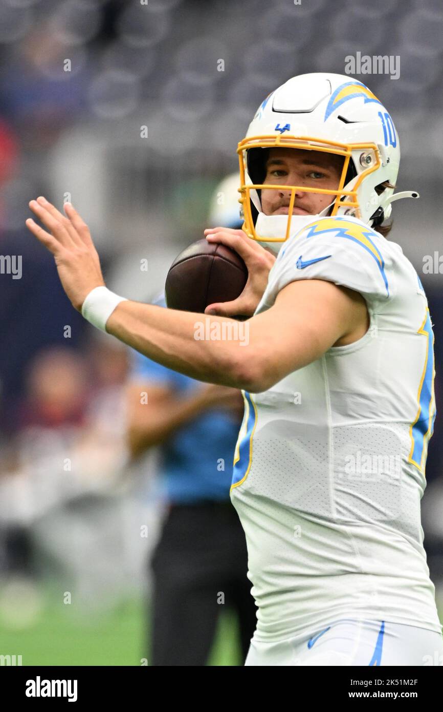 Los Angeles Chargers quarterback Justin Herbert (10) is escorted by senior  public relations manager Jamaal LaFrance after training camp on Tuesday, A  Stock Photo - Alamy