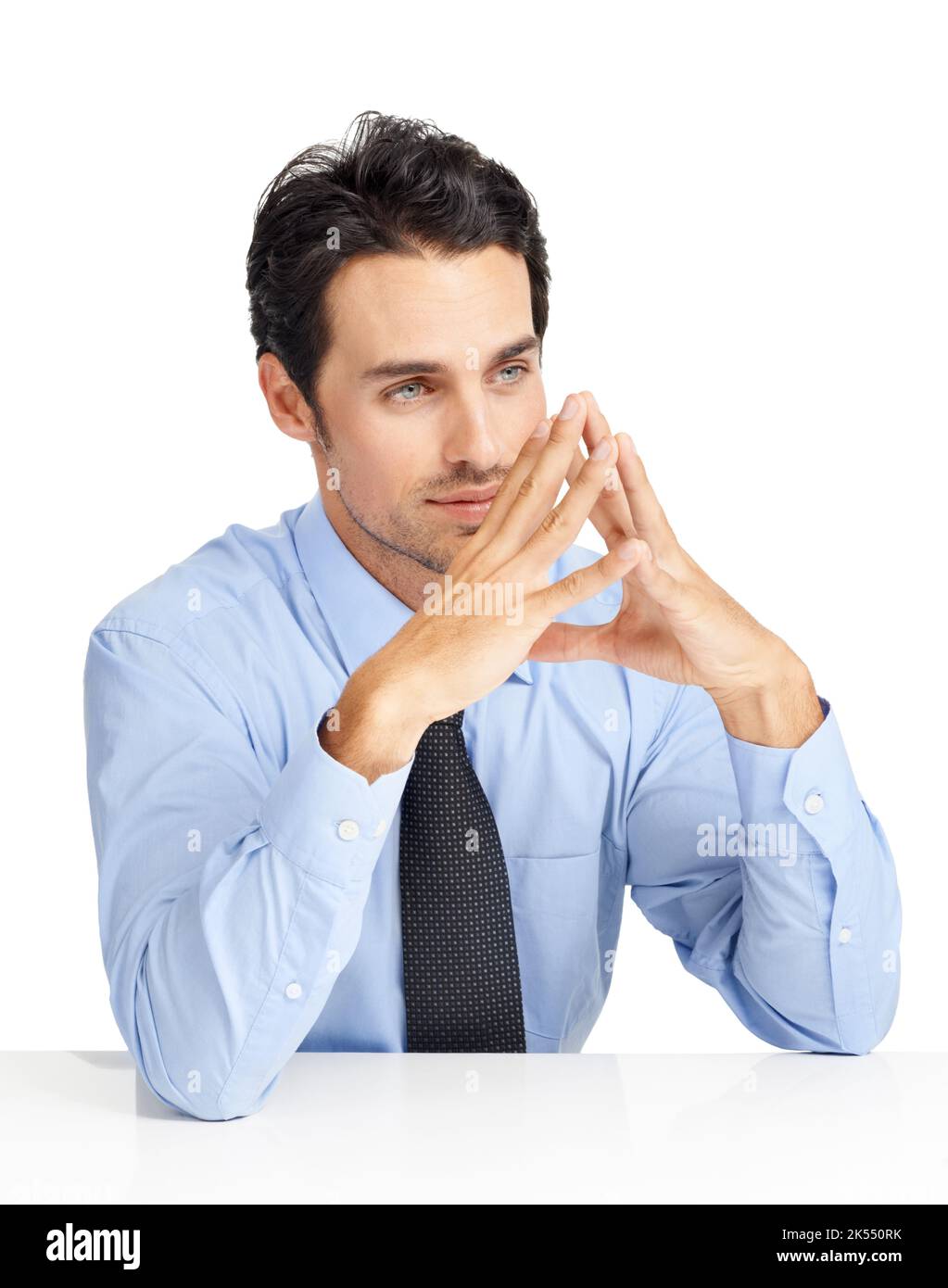 Strategie ist seine unternehmerische Stärke. Ein gutaussehender Geschäftsmann, der nachdenklich im Studio sitzt. Stockfoto