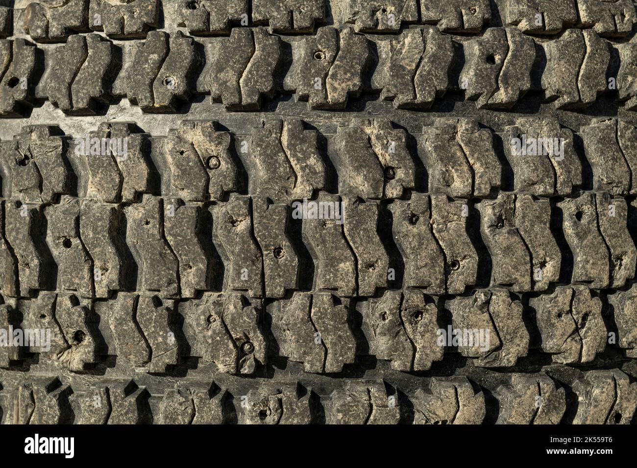 Abgenutztes Winterreifen-Muster - Stock Foto Stockfoto